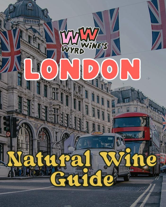 Image of Street in London with taxi and red bus and flags