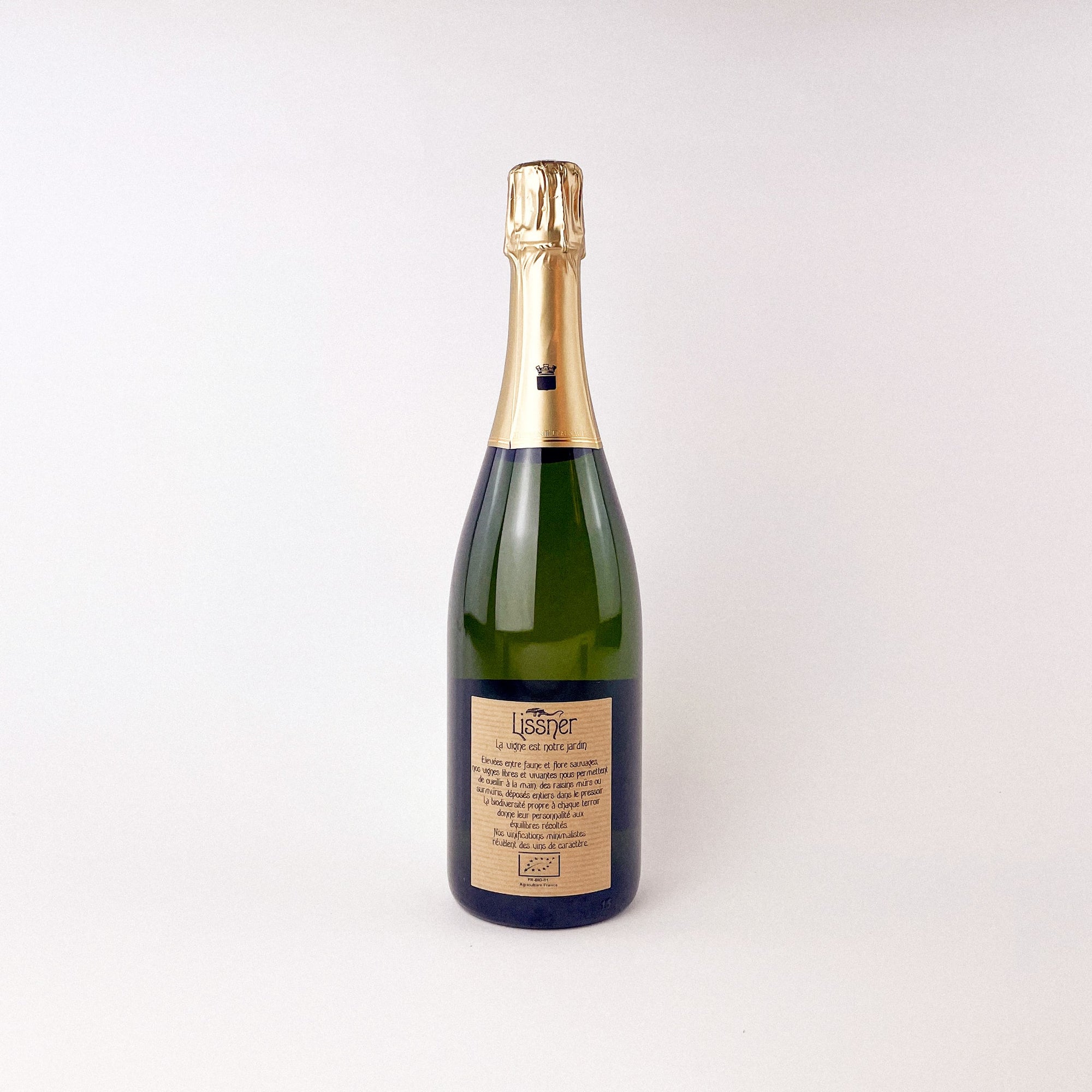 A Bottle Of Crémant Chardonnay Natural Wine from France Back View