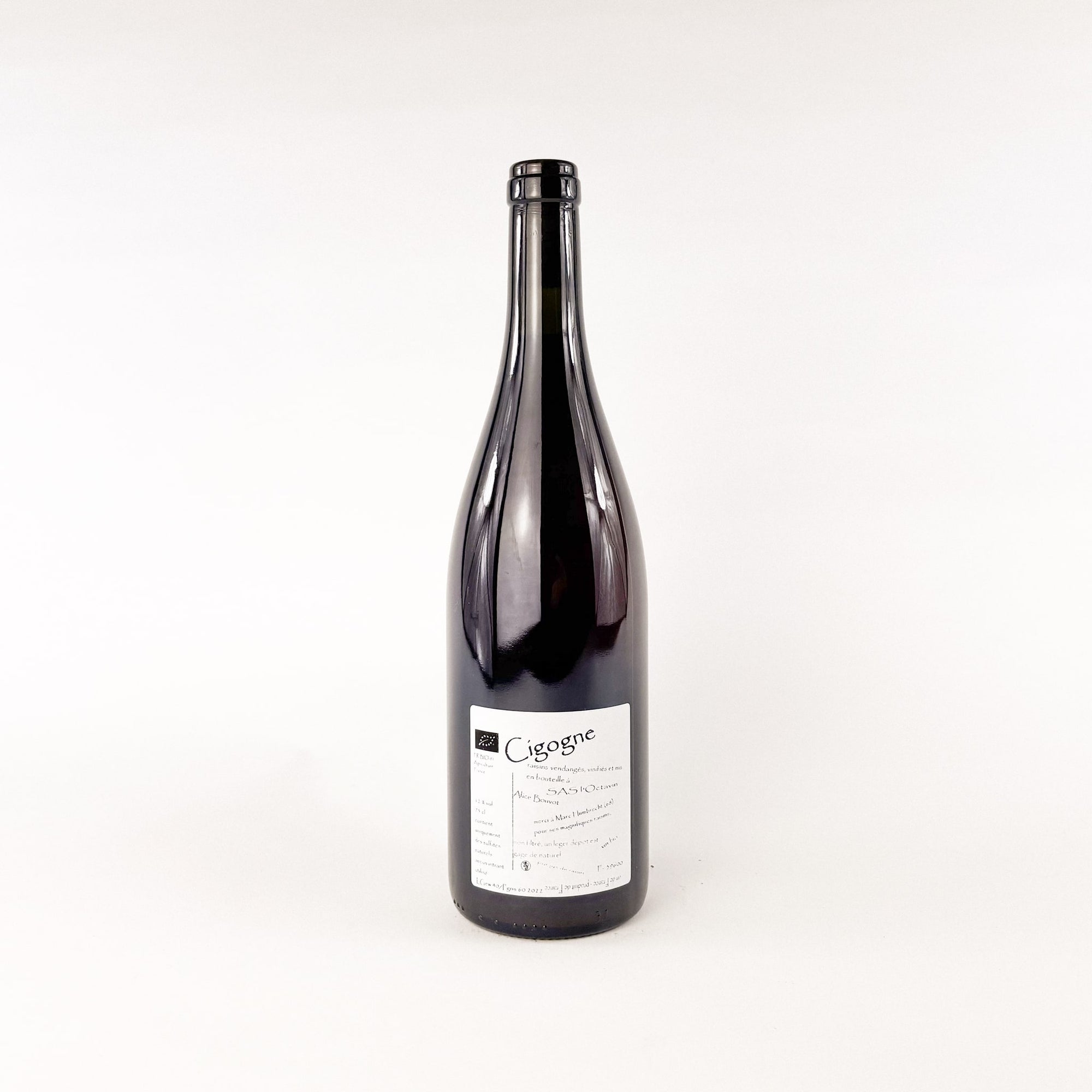 A bottle of red natural wine by Alice Bouvot of L'Octavin Cigogne Vert back view