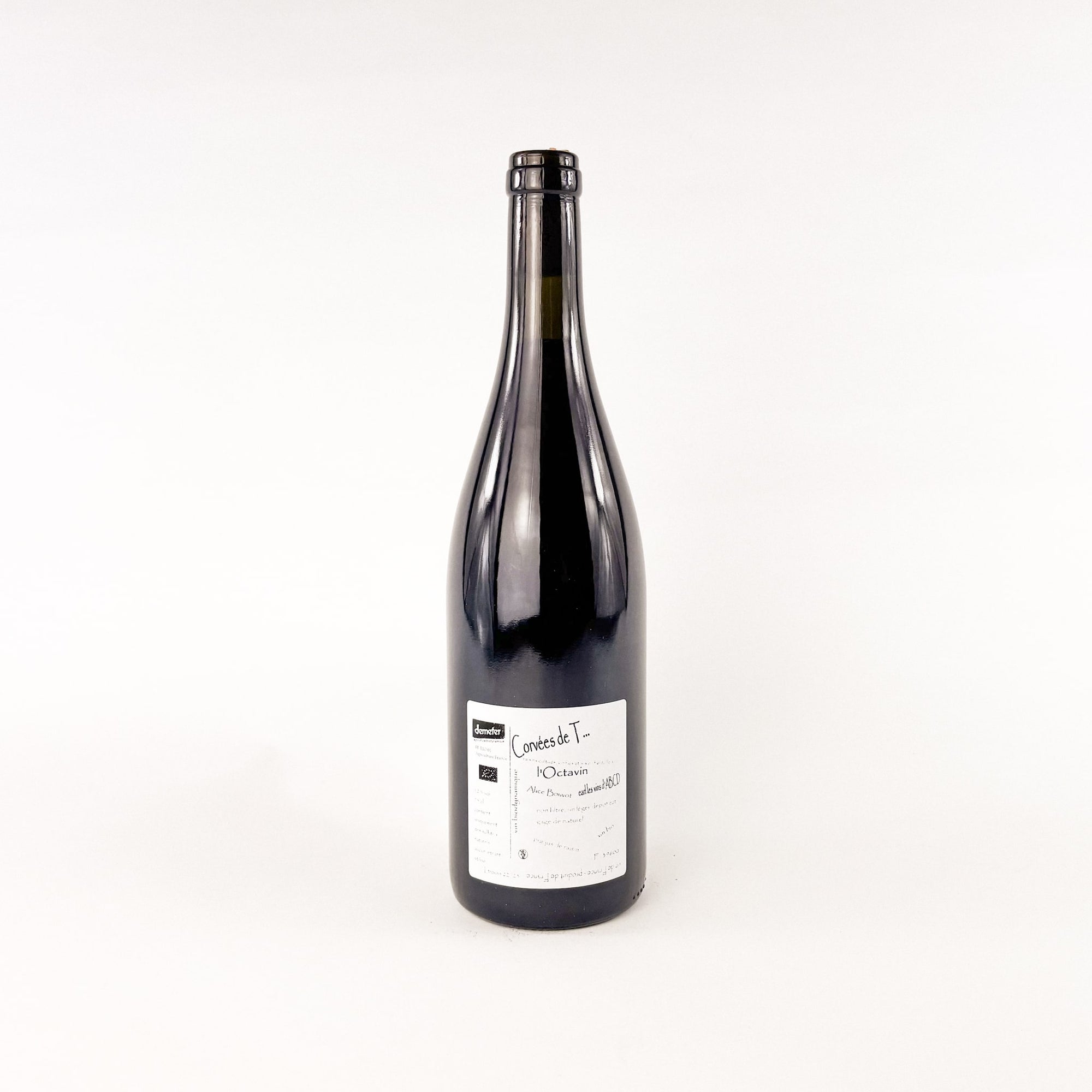 A bottle of red natural wine by L'Octavin Alice Bouvot Corvees De T back view