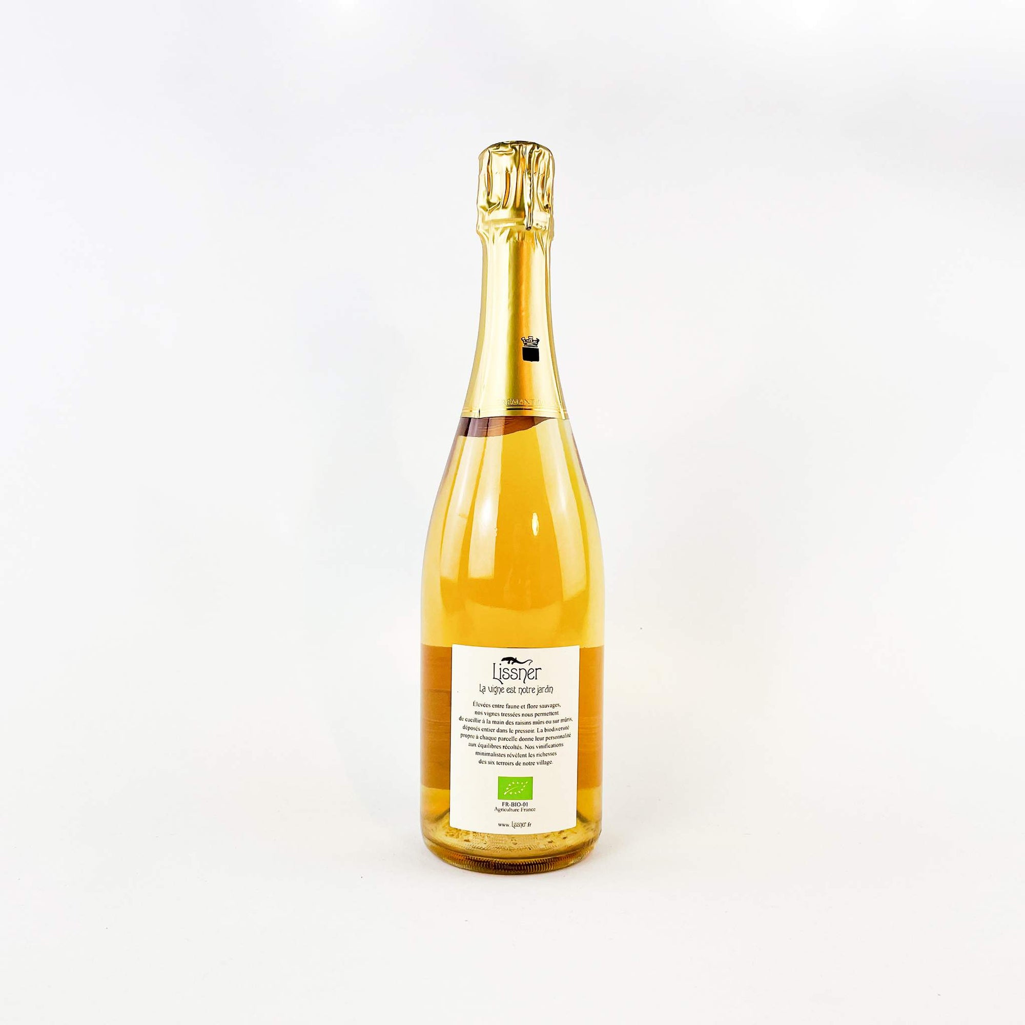 A bottle of natural Cremant D'Alsace Blanc De Noire Domaine Lissner Back View