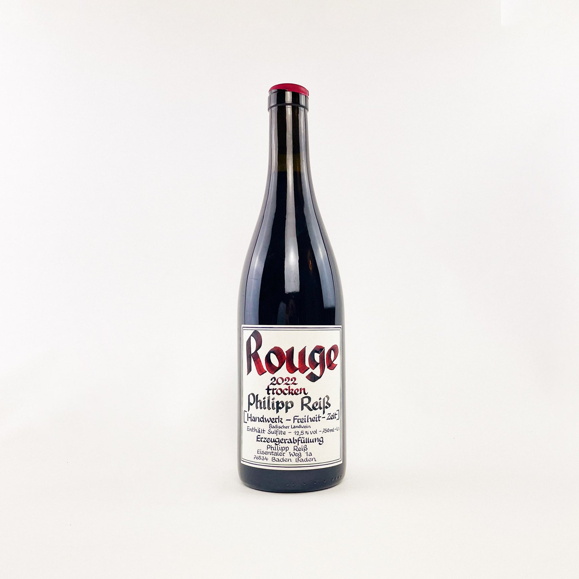 A bottle of natural red wine Rouge by Philipp Reiss