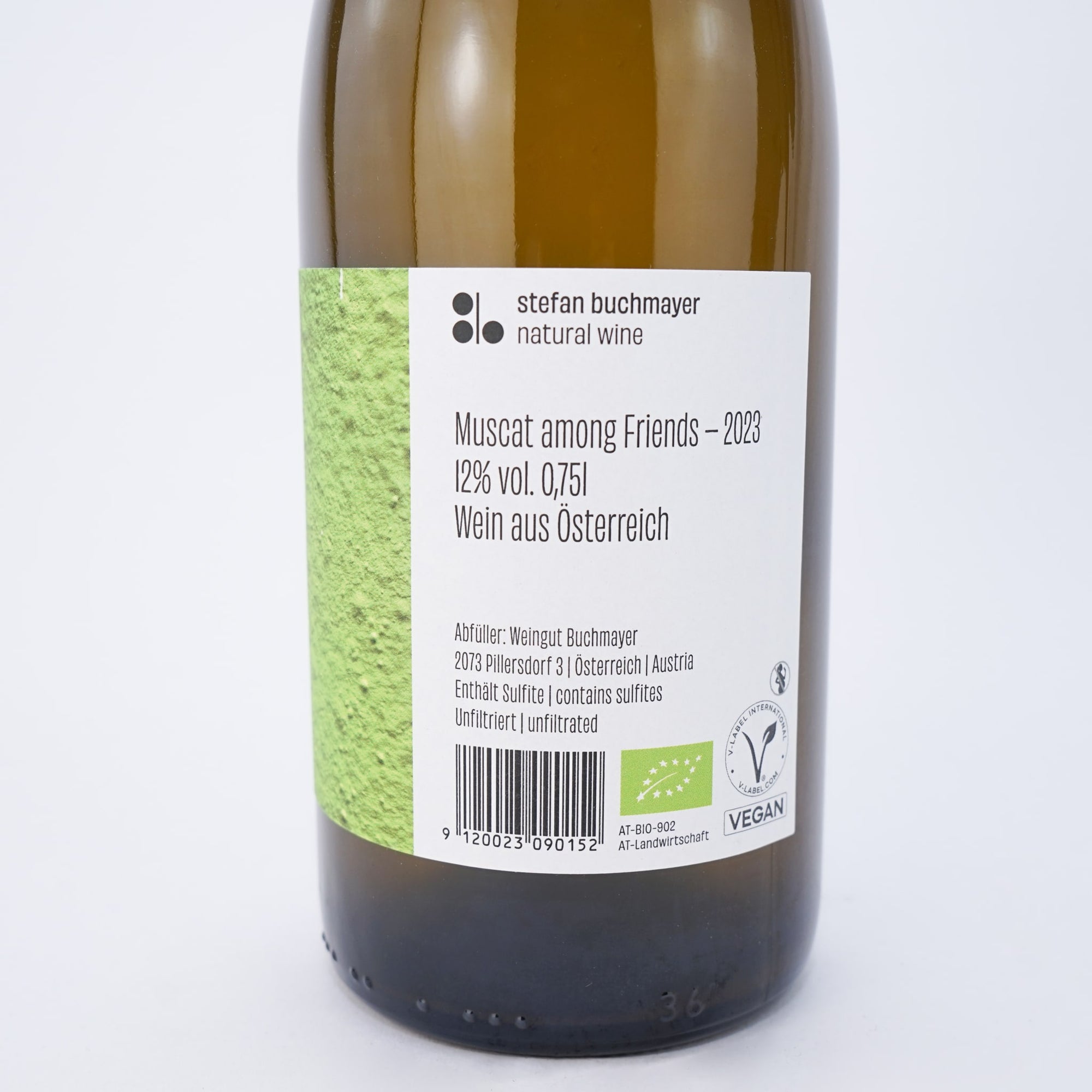 Wine bottle with a label on a white background close up