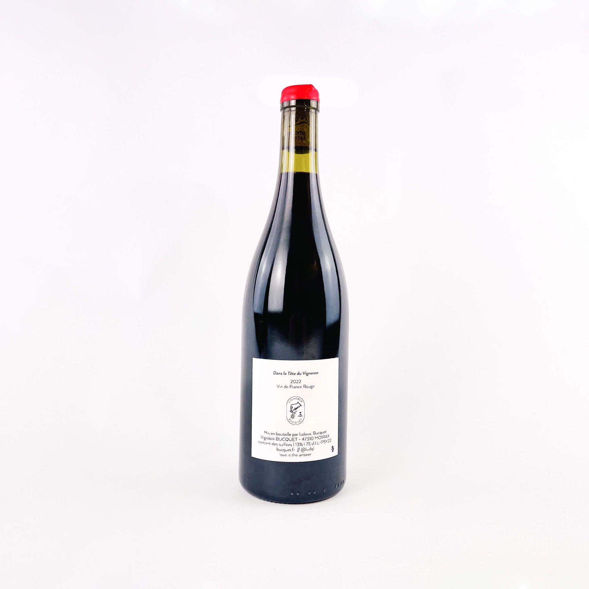 a bottle of red natural wine Vignoble Buquet Dans la Tete de Vigneron Back View